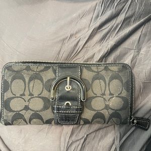 All black coach wallet, great for multiple cards and cash!